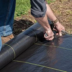 3.2oz Premium Woven Ground Cover 12ft (Folded) X 300ft 10 3.2oz Premium Woven Ground Cover 12ft (Folded) X 300ft -Garden And Outdoor Store gc123 live cutting 5.2.23 1